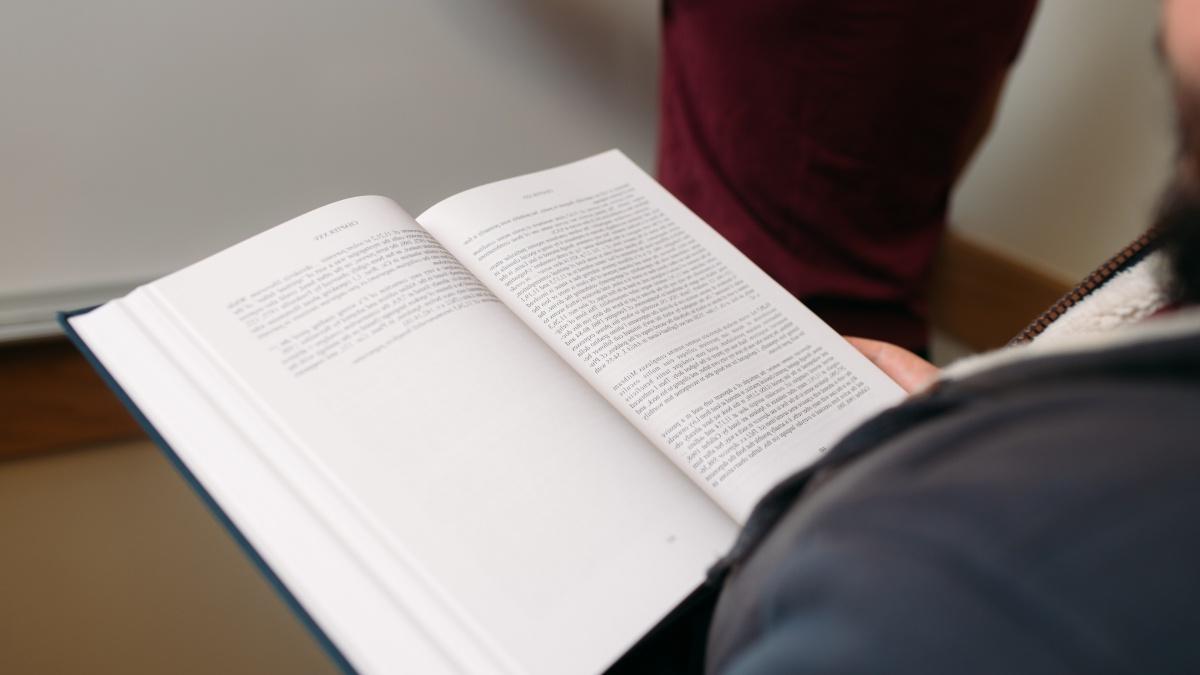 A book being held open