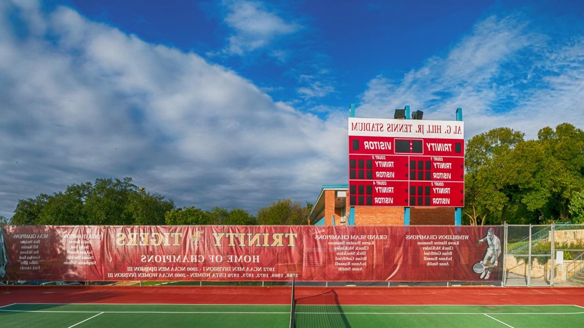 A banner honoring 澳门金沙线上赌博官网 grads who have won major professional titles hangs on the back wall of the 澳门金沙线上赌博官网 tennis courts